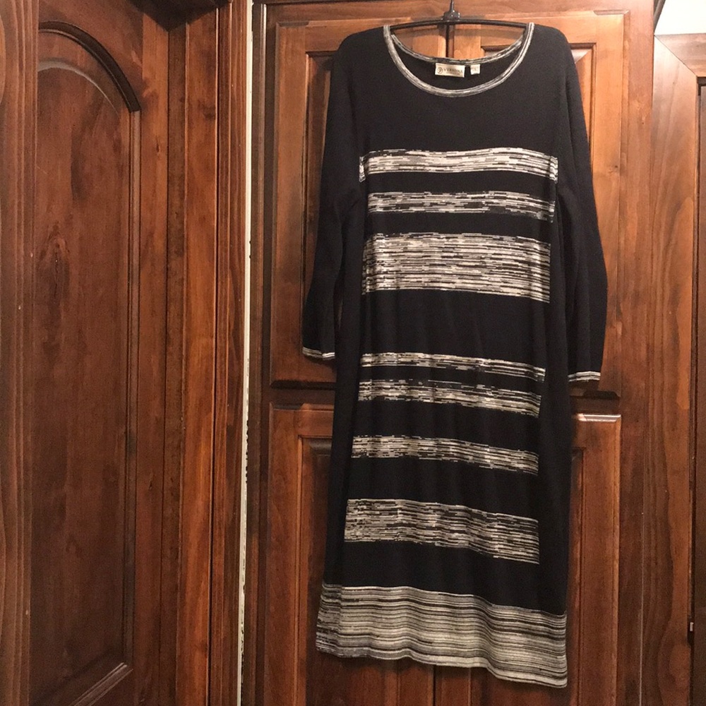 Women’s sweater dress with long sleeves.
